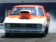 Orange CAMARO Drag Car doing burnout